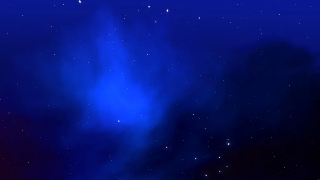A field of stars among a deep blue nebula